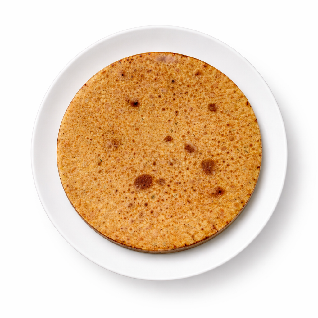 golden khakra on white plate